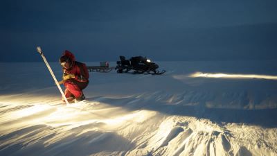 Alain Hubert taking up GPS positions on the Antarctic Plateau for the Glacioclim project - © International Polar Foundation - RenĂ© Robert